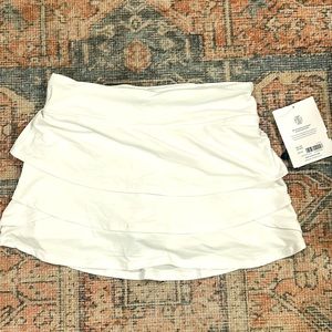 NWT white athleta girl reared tennis skirt, size 12